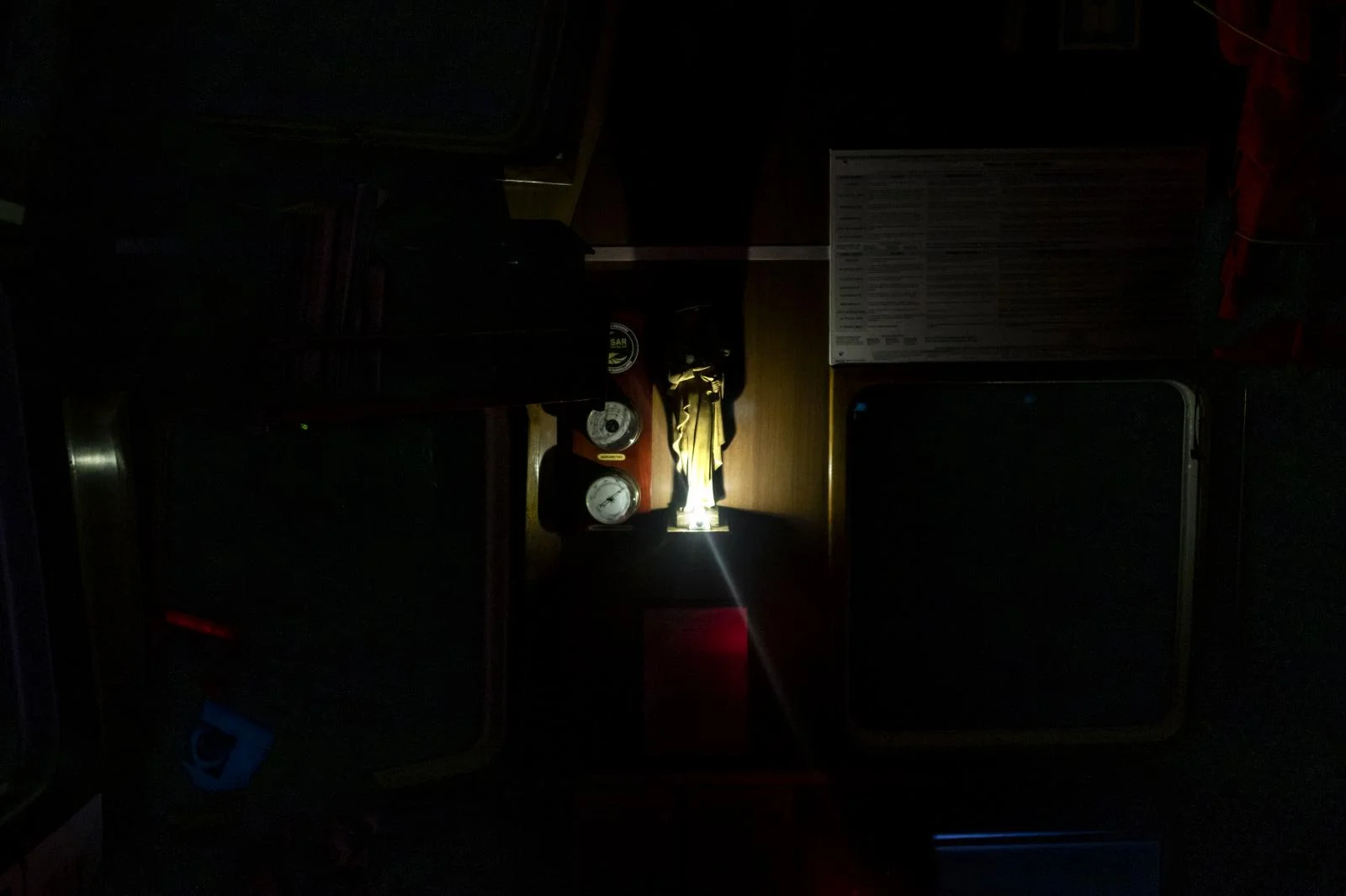 Statue of the Virgin of Carmen ,also called Star of the Sea, patron saint of sailors, with a small switch on light at her feet is seen at the bridge of the Spanish NGO Open Arms boat, Tuesday, Feb.9