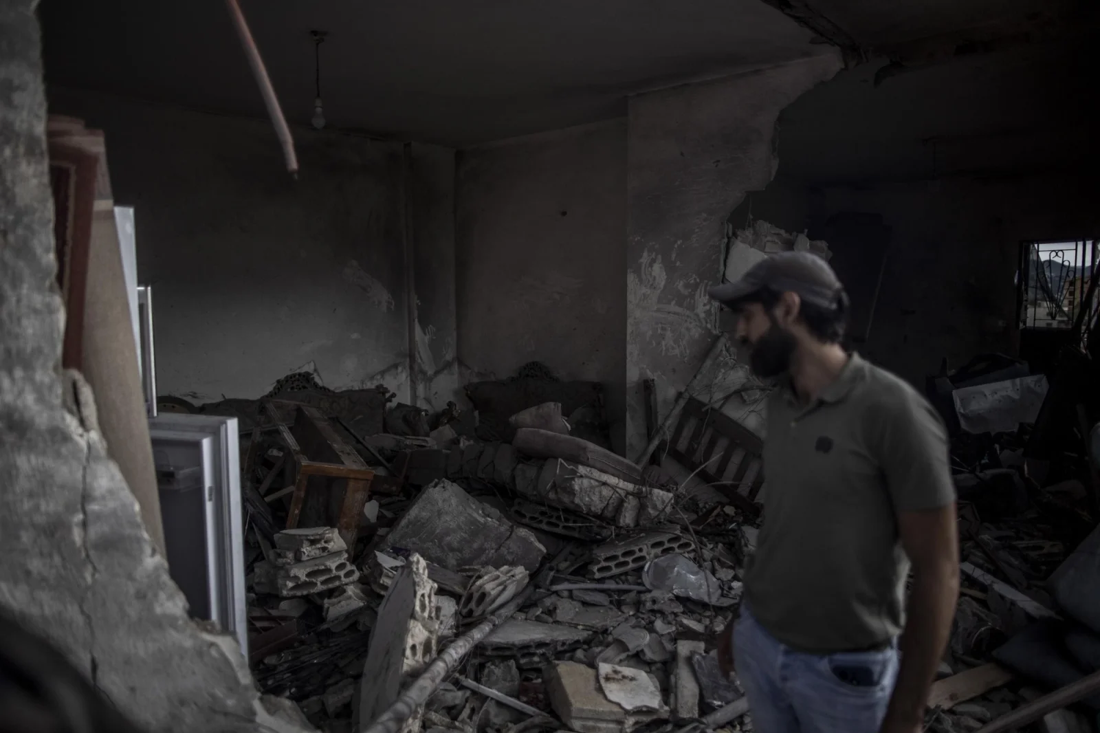 To the right: Mohammad Fayad, a local Hezbollah official,