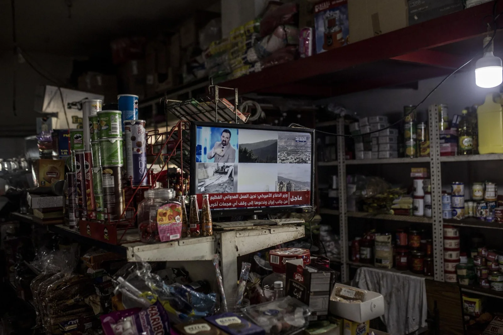 A television showing the latest news on the situation in