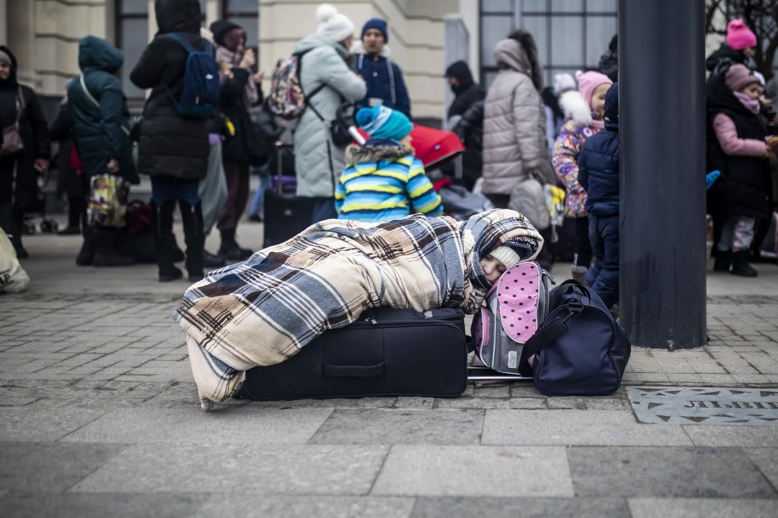 Thousands of people gather at the Lviv-Holovnyi train station in western Ukraine in an attempt to leave the country to flee the war.