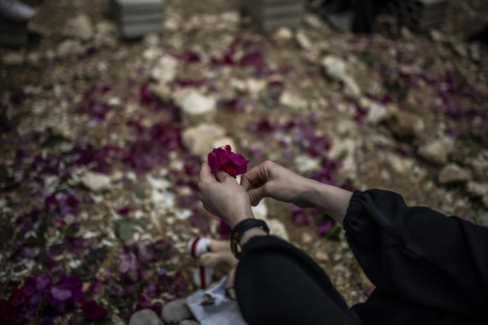 Views of the hands of Fatima Jihad Zreik (33) holding a